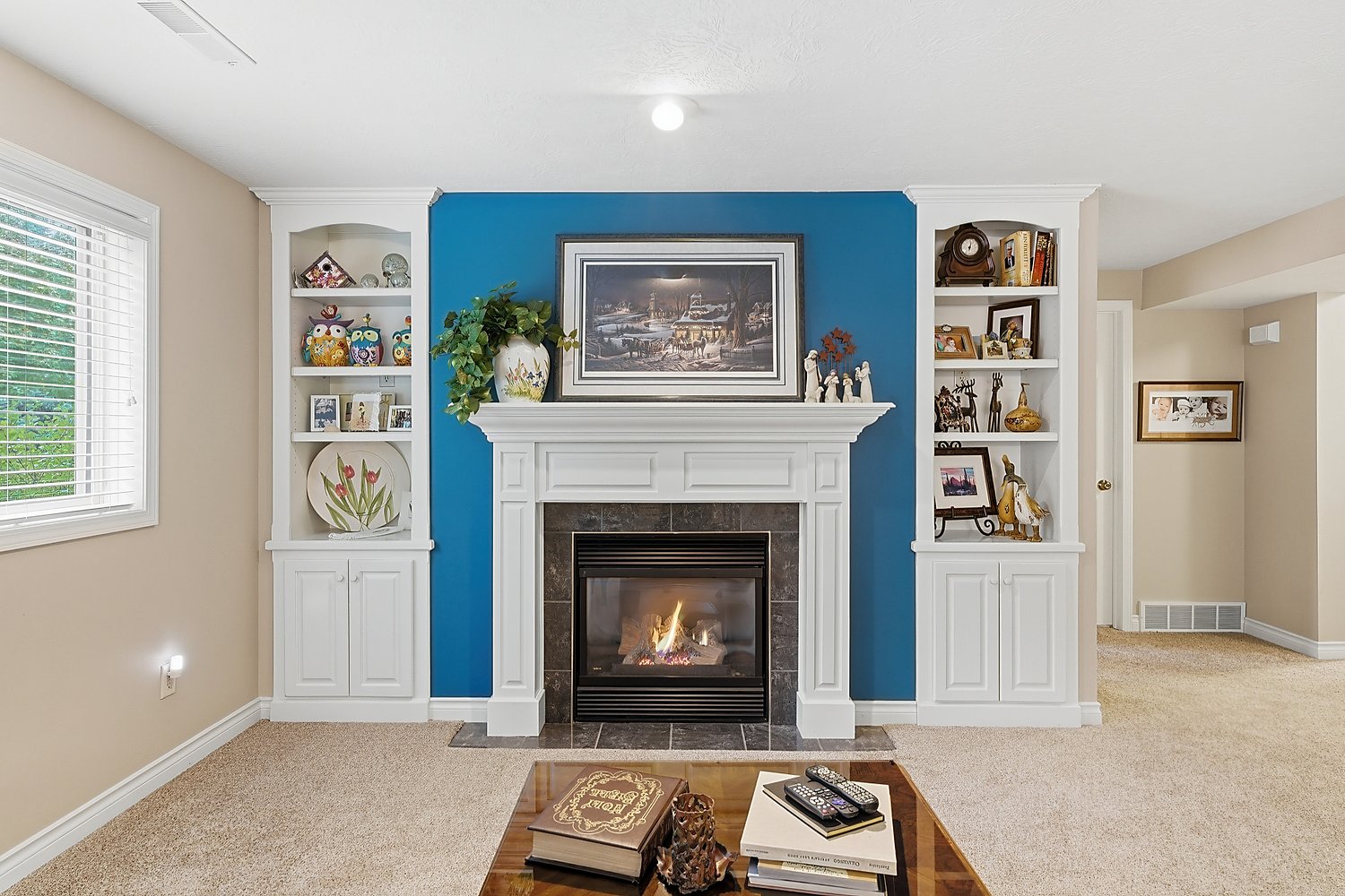 Living room with blue fireplace