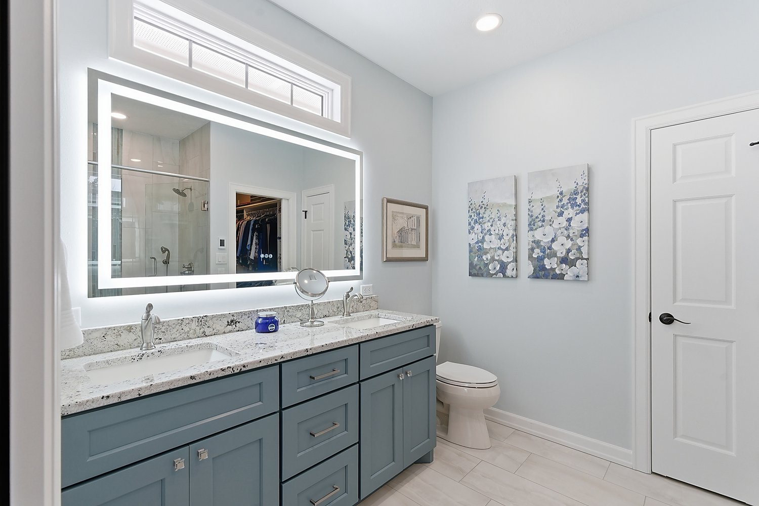 Bathroom with teal vanity